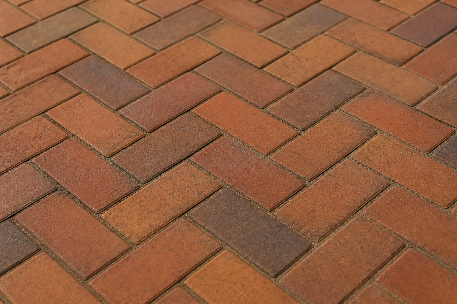 Clay brick paving in a warm running-bond pattern